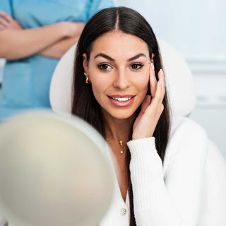 Woman sitting in a chair with a blurred background