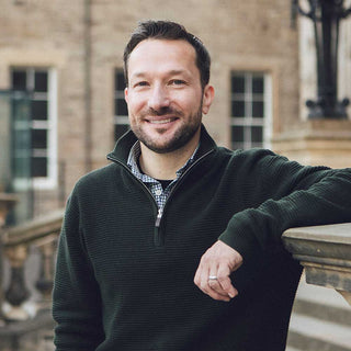 Dr Simon Smail smiling outside 