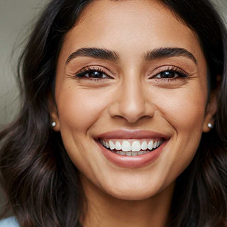 Close-up of a woman with a bright smile